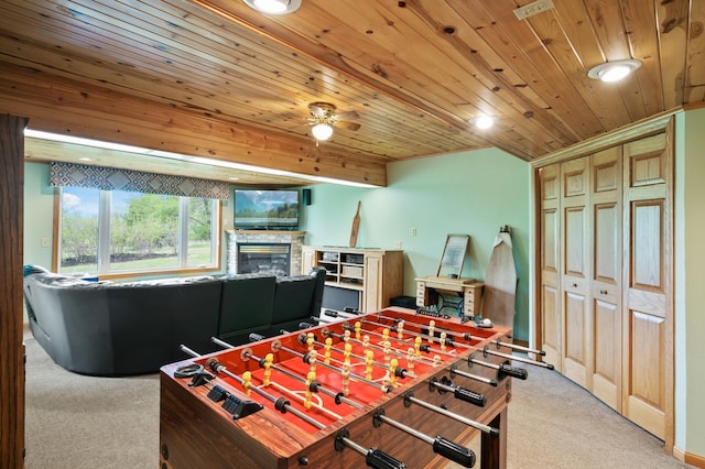 15777 Grover Ave NW, Clearwater Twp, MN 55320 - rec room featuring carpet, a fireplace, ceiling fan, and wooden ceiling