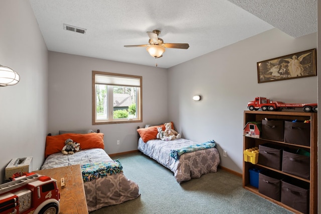 15777 Grover Ave NW, Clearwater Twp, MN 55320 - carpeted bedroom featuring baseboards, a textured ceiling, and a ceiling fan