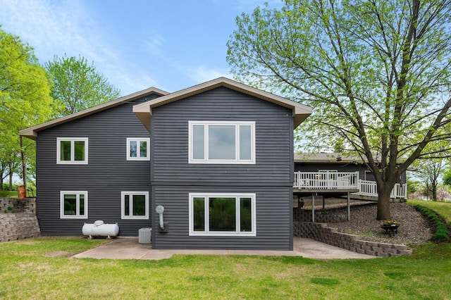 15777 Grover Ave NW, Clearwater Twp, MN 55320 - back of house with a patio area, central air condition unit, and a lawn