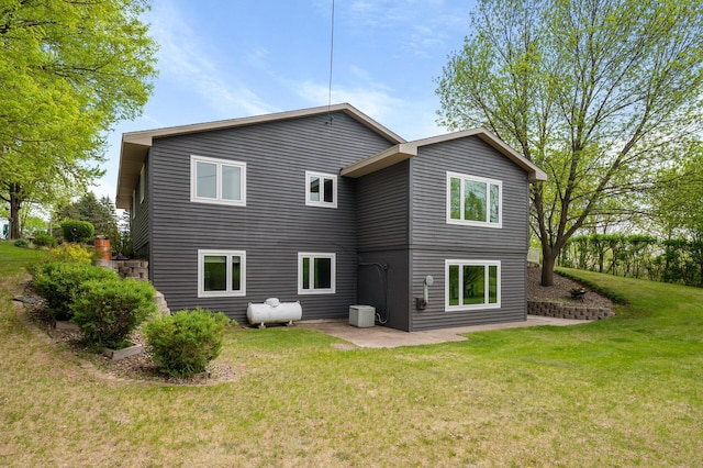 15777 Grover Ave NW, Clearwater Twp, MN 55320 - back of property with a lawn and a patio area
