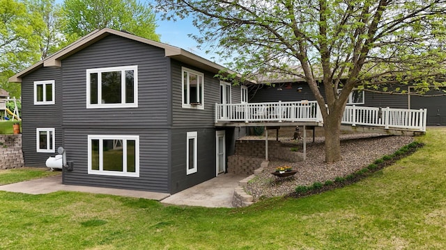 15777 Grover Ave NW, Clearwater Twp, MN 55320 - rear view of house featuring a yard, a deck, and a patio