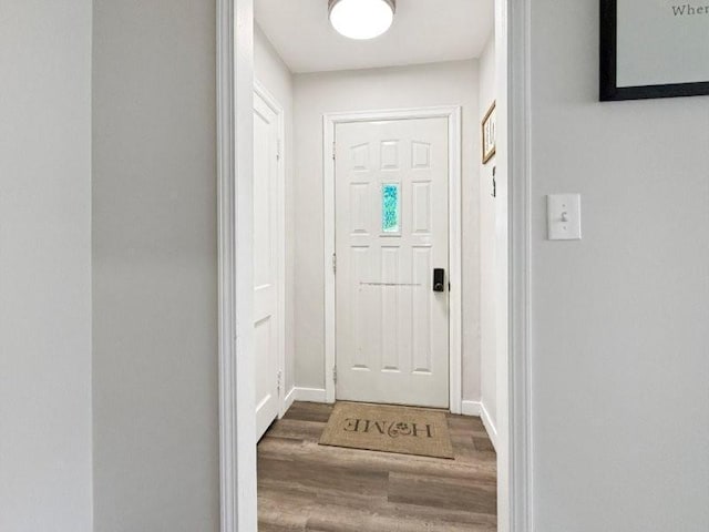 213 1st Ave E, Truman, MN 56088 - doorway with wood finished floors and baseboards
