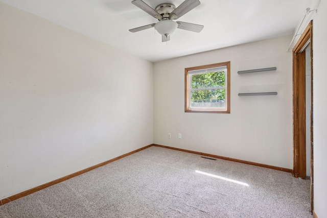 unfurnished bedroom with carpet flooring, baseboards, and ceiling fan