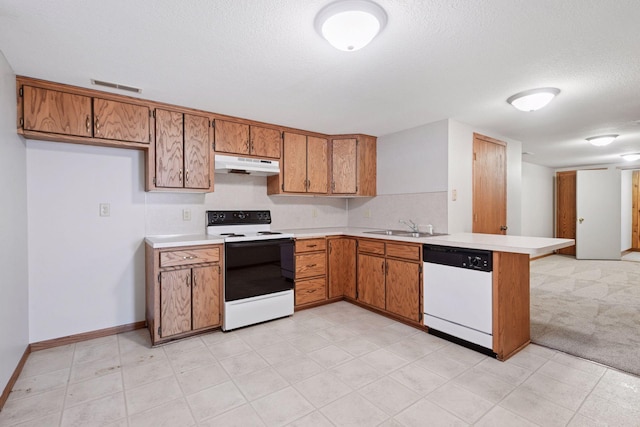 kitchen featuring white dishwasher, under cabinet range hood, electric range oven, brown cabinets, and light countertops