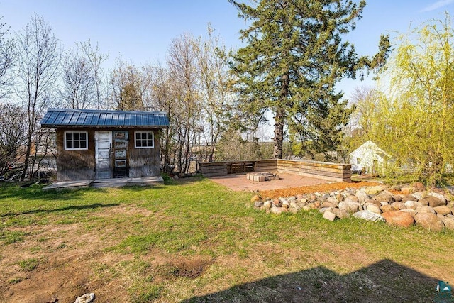 1815 Carlton Ave, Cloquet, MN 55720 - view of grassy yard featuring an outbuilding