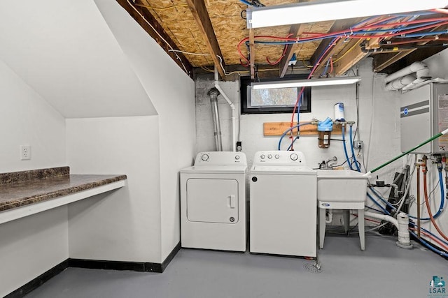 1815 Carlton Ave, Cloquet, MN 55720 - washroom with washer and clothes dryer and baseboards