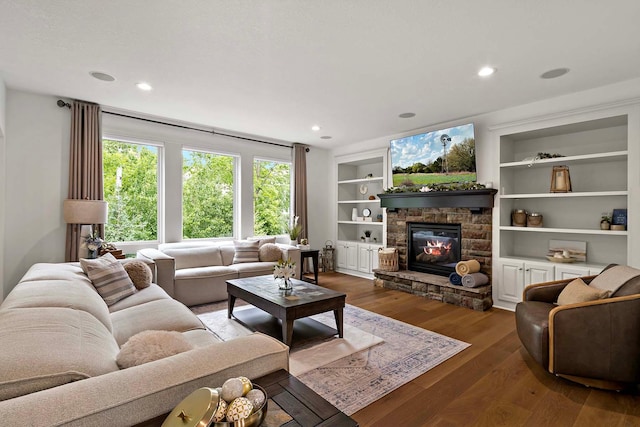 5315 Ranchview Ln N, Plymouth, MN 55446 - living area with a fireplace, wood finished floors, recessed lighting, and built in features