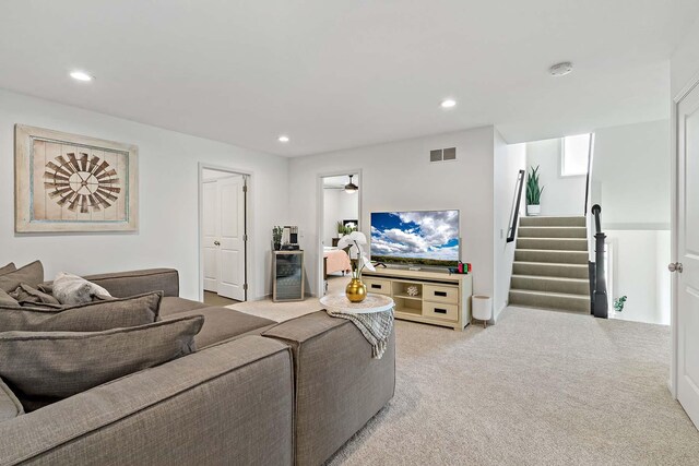 5315 Ranchview Ln N, Plymouth, MN 55446 - living room featuring light carpet, stairs, and recessed lighting