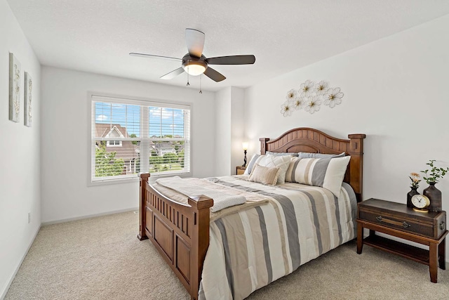 5315 Ranchview Ln N, Plymouth, MN 55446 - bedroom with light carpet, a ceiling fan, and baseboards