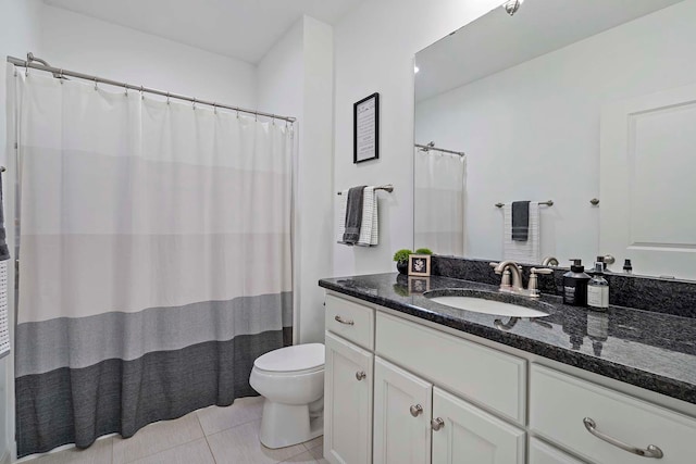 5315 Ranchview Ln N, Plymouth, MN 55446 - full bathroom with toilet, vanity, and tile patterned flooring