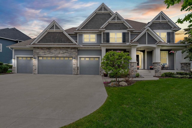 5315 Ranchview Ln N, Plymouth, MN 55446 - craftsman-style house with a lawn, concrete driveway, covered porch, stone siding, and an attached garage