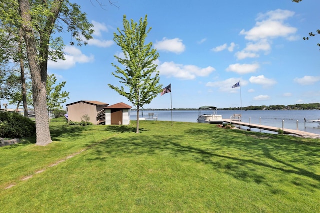 1379 7th Ave SE, Forest Lake, MN 55025 - view of grassy yard with a dock and a water view