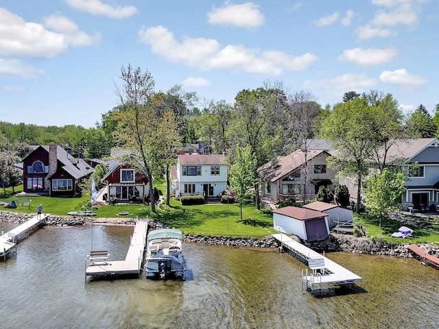 1379 7th Ave SE, Forest Lake, MN 55025 - dock featuring a residential view, a water view, and a yard