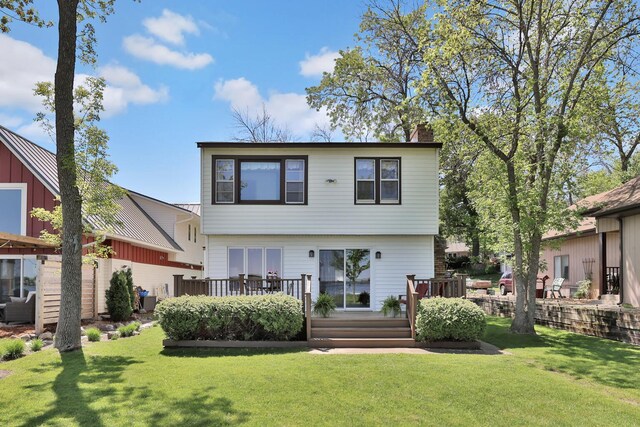 1379 7th Ave SE, Forest Lake, MN 55025 - rear view of property featuring a deck, a chimney, and a yard