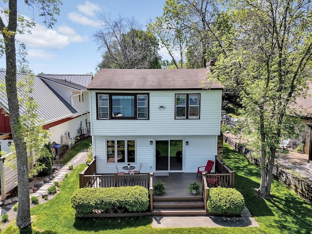 1379 7th Ave SE, Forest Lake, MN 55025 - view of front of property with a deck, a front lawn, and roof with shingles