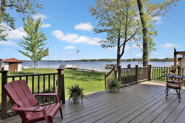 1379 7th Ave SE, Forest Lake, MN 55025 - wooden terrace featuring a water view and a yard