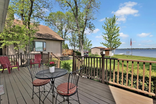 1379 7th Ave SE, Forest Lake, MN 55025 - deck with a water view and a lawn