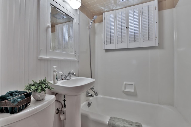 1379 7th Ave SE, Forest Lake, MN 55025 - bathroom featuring toilet and bathtub / shower combination