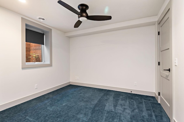 5808 Oaklawn Ave, Edina, MN 55424 - spare room featuring a ceiling fan, dark carpet, and baseboards
