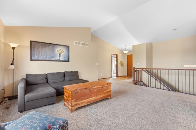 829 Dubuque Blvd, Zumbrota, MN 55992 - carpeted living room with lofted ceiling and baseboards