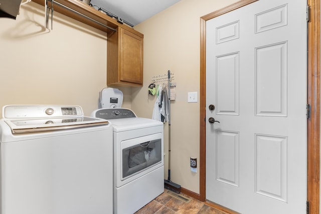 829 Dubuque Blvd, Zumbrota, MN 55992 - laundry room with cabinet space and washing machine and clothes dryer