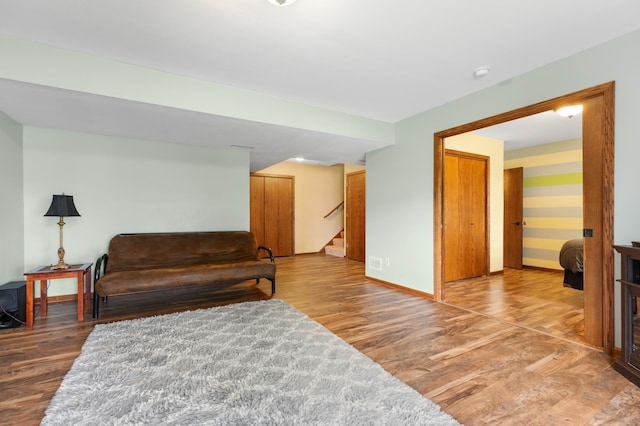 829 Dubuque Blvd, Zumbrota, MN 55992 - sitting room with wood finished floors and stairway