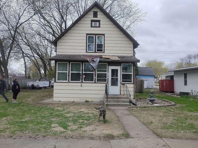 411 5th St, Montevideo, MN 56265 - view of front of house with entry steps and roof with shingles