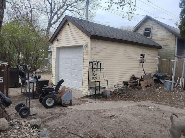 411 5th St, Montevideo, MN 56265 - detached garage featuring fence