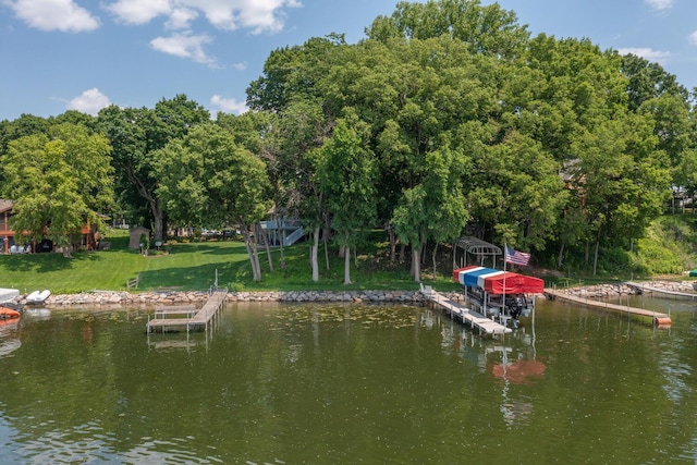 1749 Avocet Ln, Mound, MN 55364 - dock area featuring boat lift, a water view, and a yard
