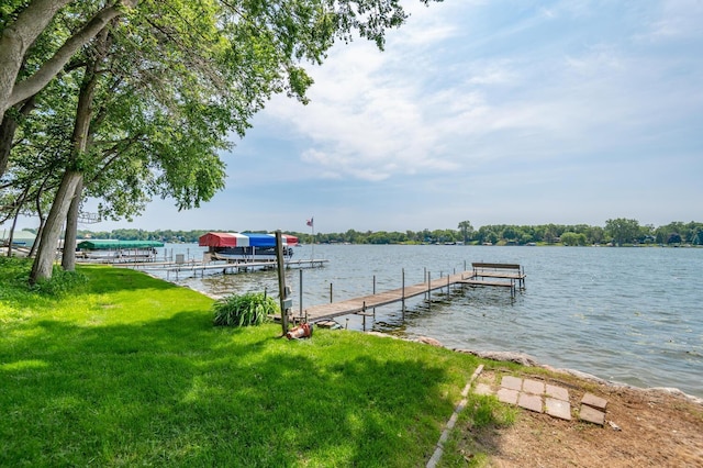 1749 Avocet Ln, Mound, MN 55364 - dock with a water view, a lawn, and boat lift