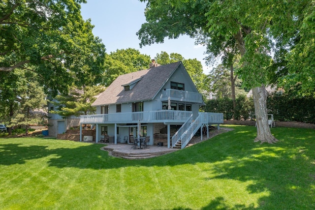 1749 Avocet Ln, Mound, MN 55364 - back of house with a patio, stairway, a yard, a chimney, and a deck