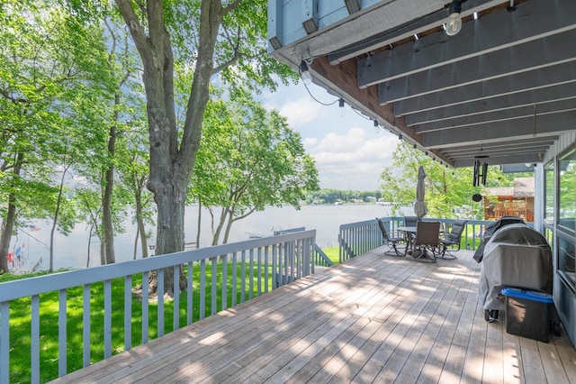 1749 Avocet Ln, Mound, MN 55364 - wooden deck with a water view, outdoor dining space, grilling area, and a yard