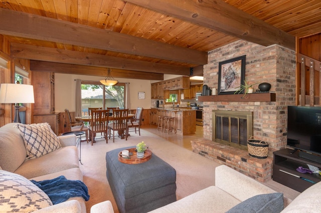 1749 Avocet Ln, Mound, MN 55364 - living area featuring a wood ceiling with exposed beams, a brick fireplace, and light colored carpet