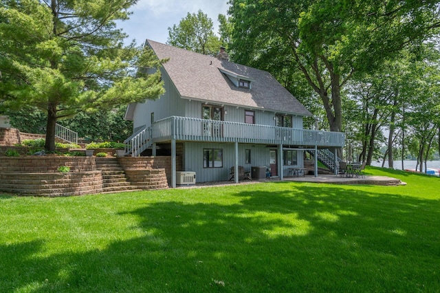 1749 Avocet Ln, Mound, MN 55364 - back of property featuring stairs, a patio, and a wooden deck