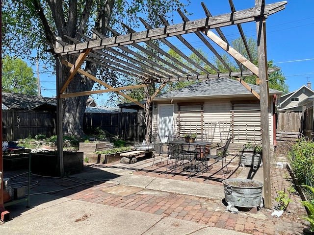 view of patio with a pergola, a fenced backyard, and outdoor dining space