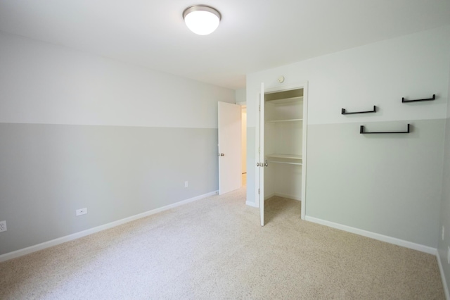 1345 Crestridge Ln Unit 203, Eagan, MN 55123 - unfurnished bedroom with light carpet, a closet, and baseboards