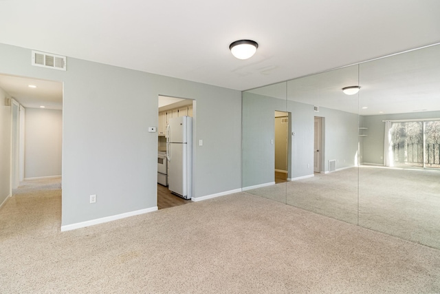 1345 Crestridge Ln Unit 203, Eagan, MN 55123 - unfurnished bedroom featuring freestanding refrigerator, carpet floors, and baseboards