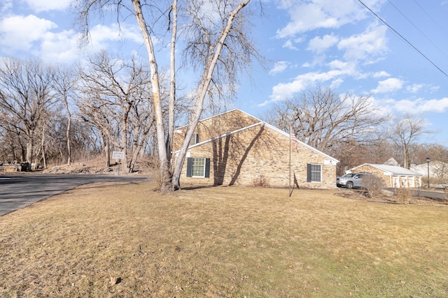 1345 Crestridge Ln Unit 203, Eagan, MN 55123 - view of side of home with a lawn and asphalt driveway