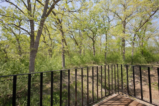 1345 Crestridge Ln Unit 203, Eagan, MN 55123 - balcony featuring a view of trees