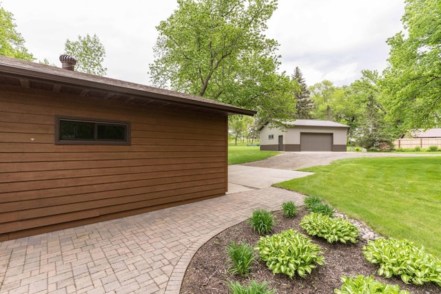22005 Statesboro Trl, Clitherall, MN 56524 - view of side of property with an outdoor structure and a lawn