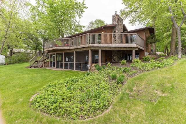 22005 Statesboro Trl, Clitherall, MN 56524 - rear view of property featuring a deck, stairs, a lawn, and a chimney
