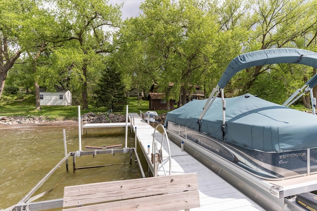 22005 Statesboro Trl, Clitherall, MN 56524 - dock with boat lift and view of scattered trees