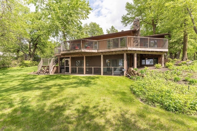 22005 Statesboro Trl, Clitherall, MN 56524 - rear view of house featuring a wooden deck, stairway, a yard, and a chimney