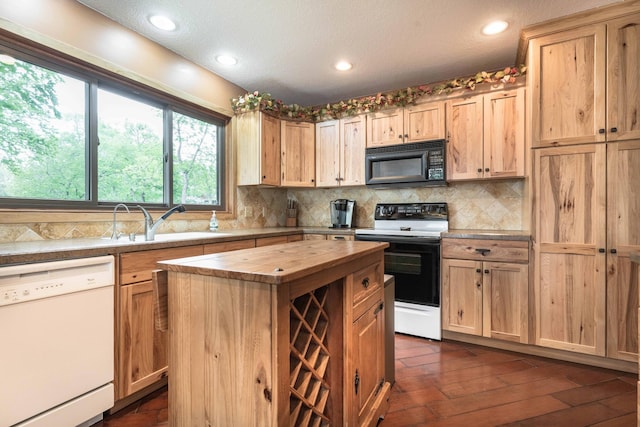 22005 Statesboro Trl, Clitherall, MN 56524 - kitchen with dishwasher, black microwave, wooden counters, range with electric cooktop, and light brown cabinetry