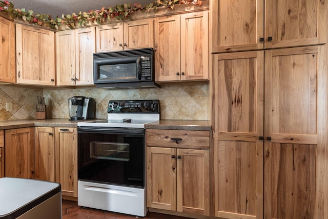 22005 Statesboro Trl, Clitherall, MN 56524 - kitchen featuring electric range oven, black microwave, tasteful backsplash, and light brown cabinets