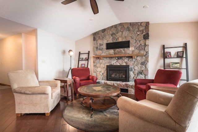 22005 Statesboro Trl, Clitherall, MN 56524 - living area featuring dark wood finished floors, ceiling fan, a fireplace, and vaulted ceiling