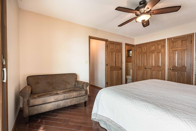 22005 Statesboro Trl, Clitherall, MN 56524 - bedroom with dark wood-style floors, baseboards, and a ceiling fan