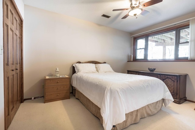 22005 Statesboro Trl, Clitherall, MN 56524 - bedroom featuring light colored carpet, a ceiling fan, and baseboards