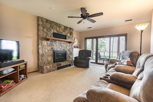 22005 Statesboro Trl, Clitherall, MN 56524 - carpeted living room featuring a fireplace, a ceiling fan, and baseboards