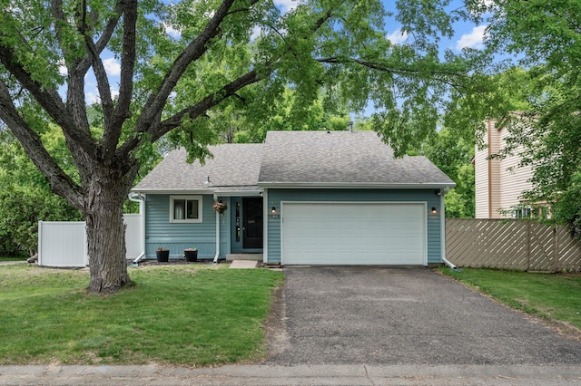 1428 Willow Creek Ln, Shoreview, MN 55126 - view of front of house featuring an attached garage, roof with shingles, and driveway